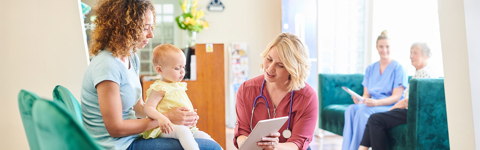 Mother and child with nurse