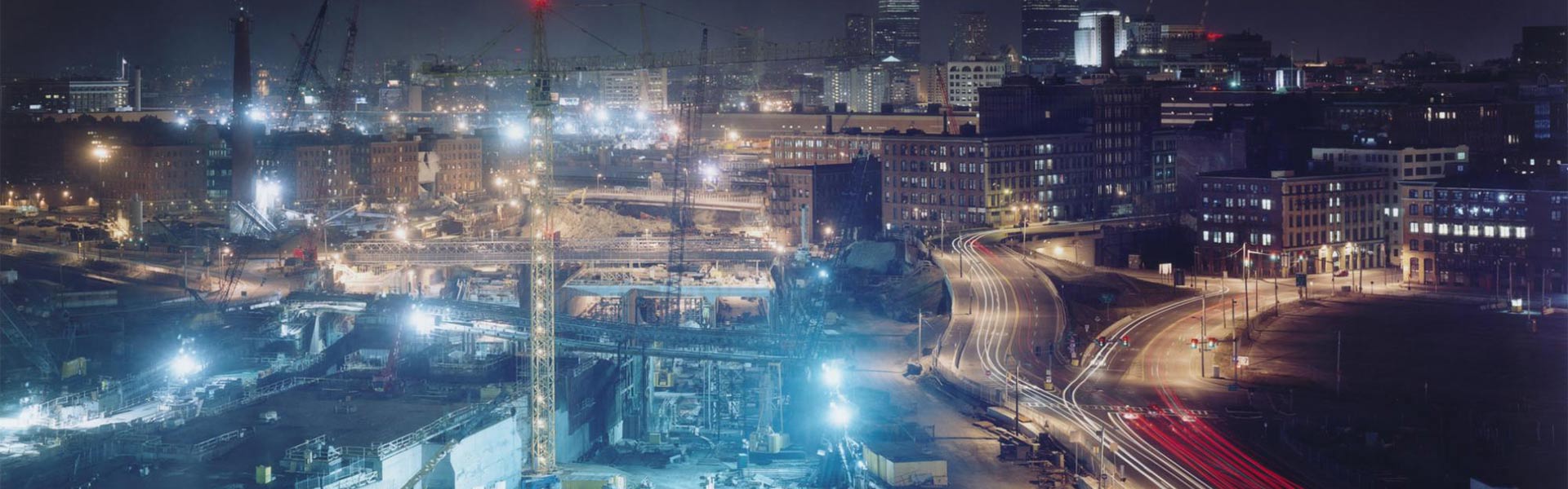 Long exposure shot of a construction site in a busy city