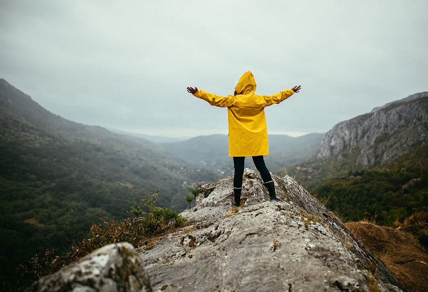 Person looking out at mountains