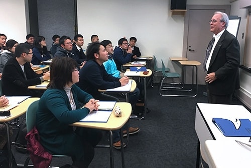Dean Matkin welcoming Tokyo BOE teachers